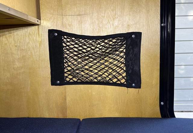 These bedside storage nets that came with the camper were installed crooked and were fairly annoy...