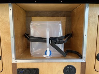 Building - Added some footman's loops to the galley cubby in my camper so that we could strap some water in ...