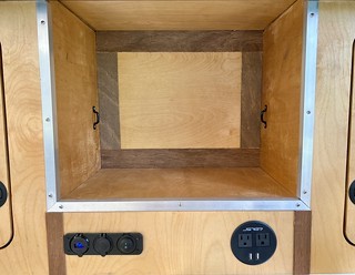 Building - Added some footman's loops to the camper cubby so that we could strap some stuff in when needed