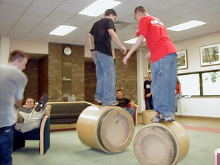 Zach pulling Nick around the room by his foot... and Jordan and Nate running around on end tables