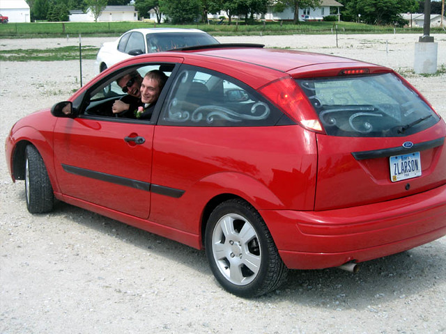 They had to run errands in Zach's car - which had already been painted with "just married" ... while wearing tuxes.