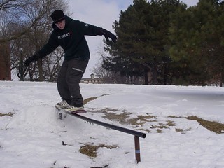Snowboarding - Zach snowskating behind pfeiffer