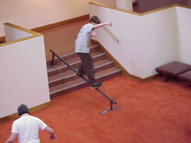Tanner grinding down the steps