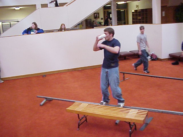 Havin a drink while soaping